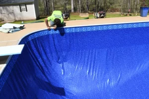 Pool employees building a pool