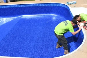 Pool employees building a pool
